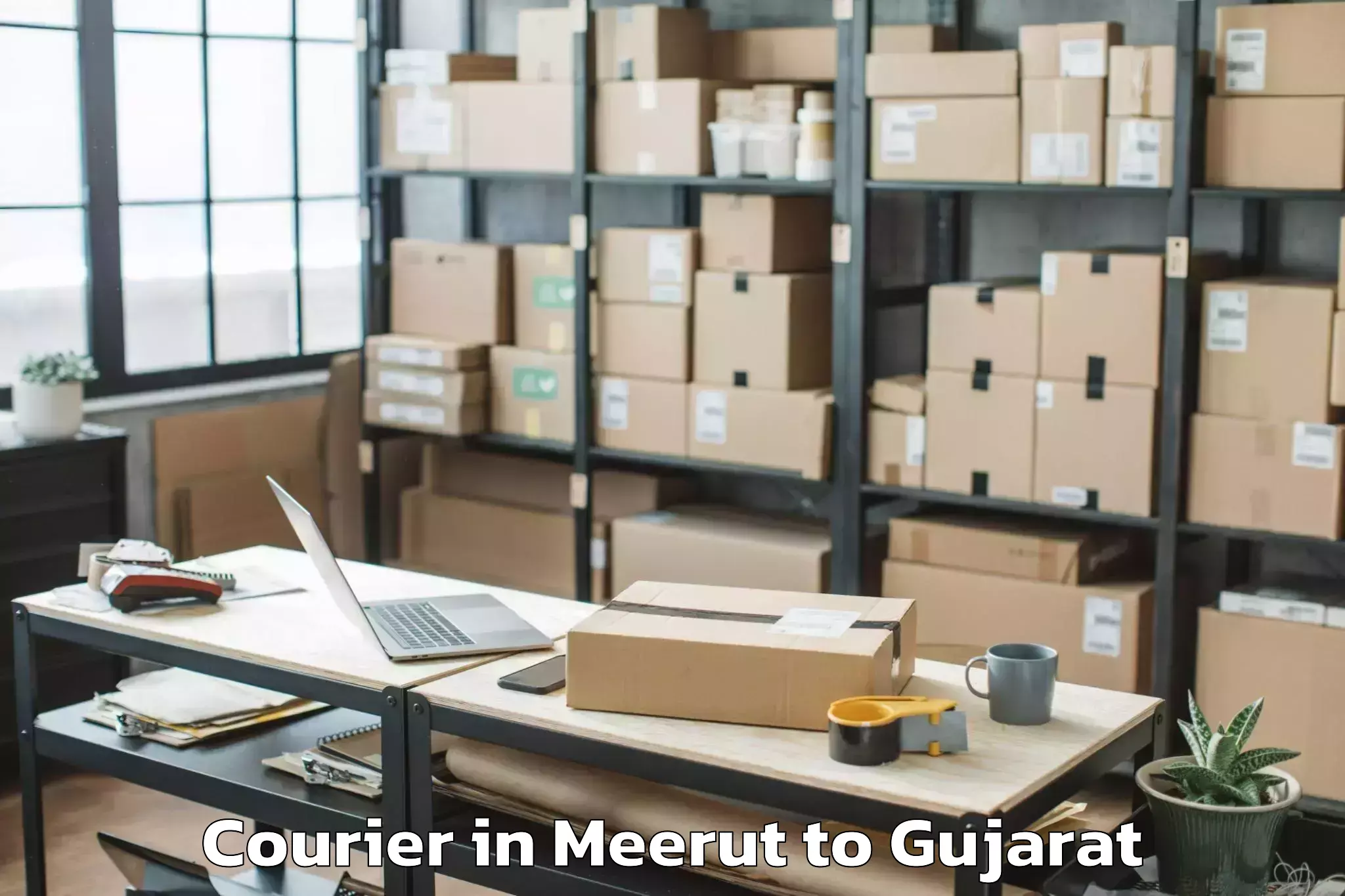 Reliable Meerut to Dholka Courier